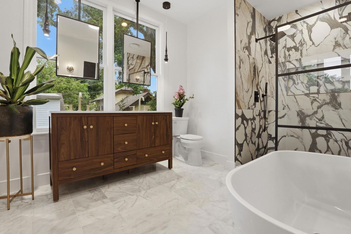 Primary bathroom with a freestanding tub and double vanity
