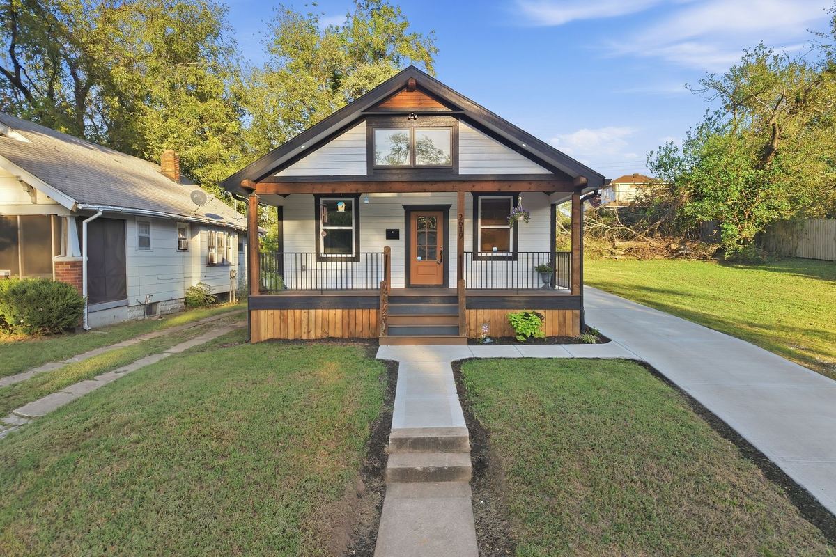 White bungalow with a covered front porch
